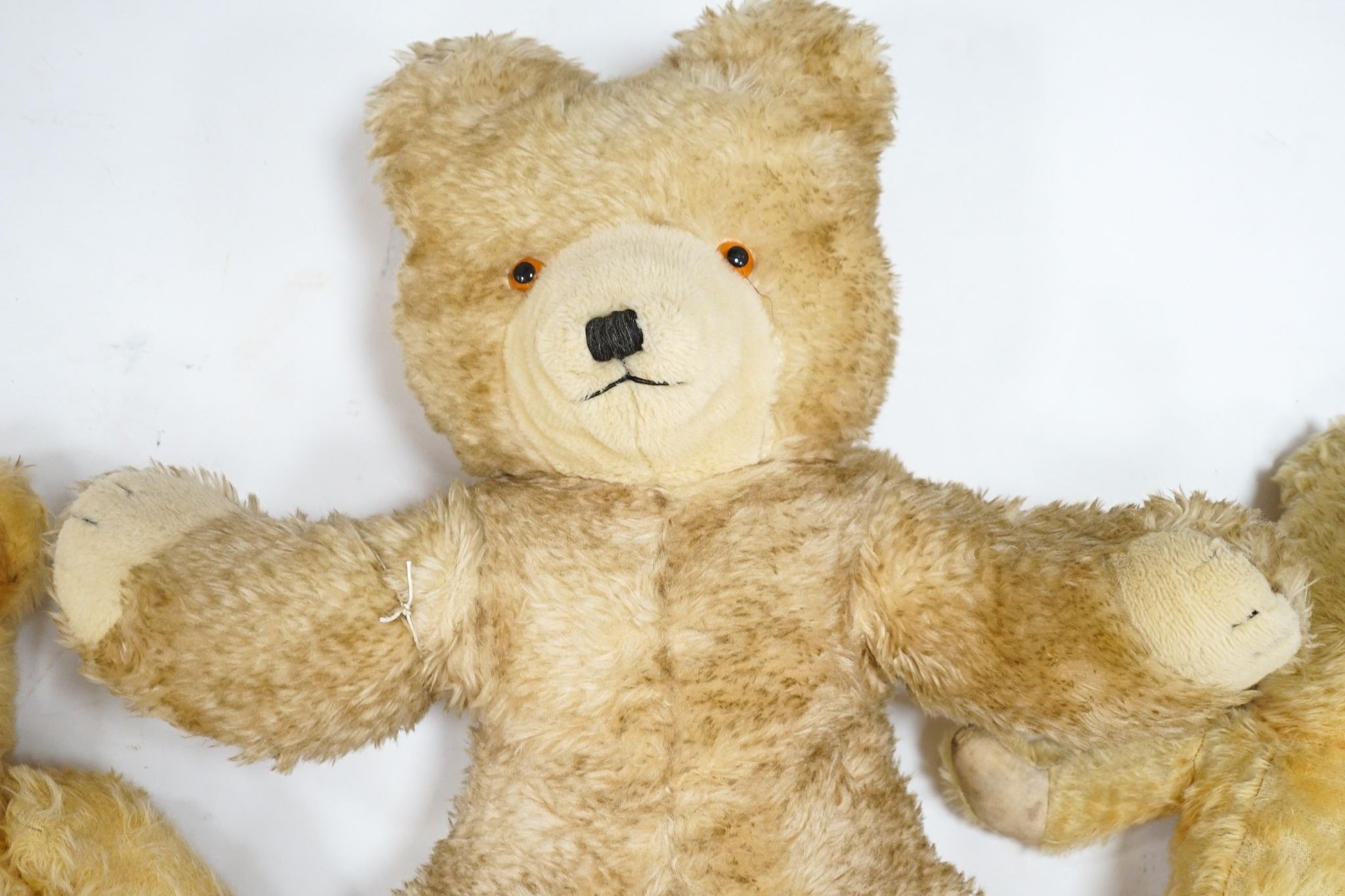 Wendy Boston, 24in. with label, good condition, together with a Deans with label, 18in., good condition and an unjointed 1950's English bear, 19in.